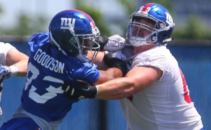 Jun 6, 2016; East Rutherford, NJ, USA; New York Giants linebacker B.J. Goodson (93) rushes New York Giants center Brett Jones (69) during organized team activities at Quest Diagnostics Training Center. Mandatory Credit: Ed Mulholland-USA TODAY Sports