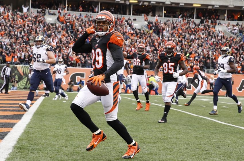 Nov 29, 2015; Cincinnati, OH, USA; Cincinnati Bengals cornerback Leon Hall (29) runs back an interception for a touchdown against the St. Louis Rams in the second half at Paul Brown Stadium. Cincinnati defeated St. Louis 31-7. Mandatory Credit: Mark Zerof-USA TODAY Sports