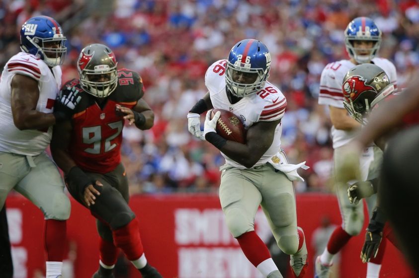 Nov 8, 2015; Tampa, FL, USA; New York Giants running back Orleans Darkwa (26) runs with the ball against the Tampa Bay Buccaneers during the first half at Raymond James Stadium. Mandatory Credit: Kim Klement-USA TODAY Sports