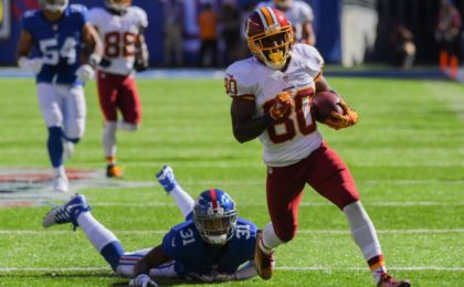 Sep 25, 2016; East Rutherford, NJ, USA; Washington Redskins wide receiver Jamison Crowder (80) carries the ball to score a touchdown during the third quarter against the New York Giants at MetLife Stadium. Mandatory Credit: Robert Deutsch-USA TODAY Sports