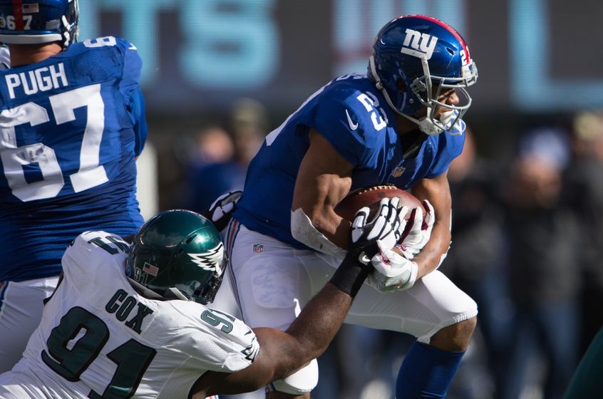 Nov 6, 2016; East Rutherford, NJ, USA; Philadelphia Eagles defensive tackle Fletcher Cox (91) tackles New York Giants running back Rashad Jennings (23) during the first half at MetLife Stadium. Mandatory Credit: William Hauser-USA TODAY Sports