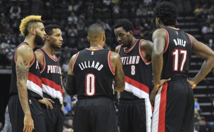 Nov 6, 2016; Memphis, TN, USA; Portland Trail Blazers guard Damian Lillard (0) and his teammates during the first half against the Memphis Grizzlies at FedExForum. Portland Trail Blazers defeats Memphis Grizzlies 100-94. Mandatory Credit: Justin Ford-USA TODAY Sports