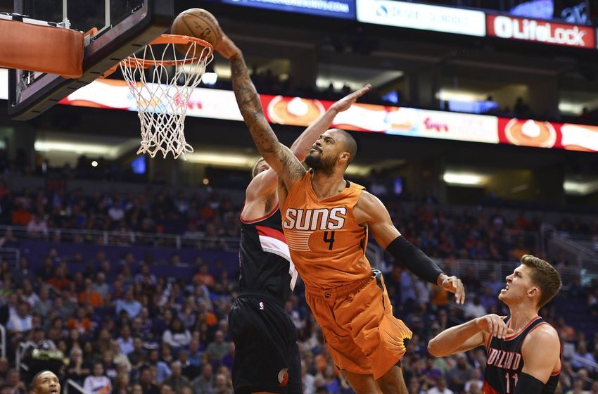 Oct 30, 2015; Phoenix, AZ, USA; Phoenix Suns Phoenix Suns center Tyson Chandler (4) dunks the ball over Portland Trail Blazers forward Mason Plumlee (24) in the first half at Talking Stick Resort Arena. Mandatory Credit: Jennifer Stewart-USA TODAY Sports