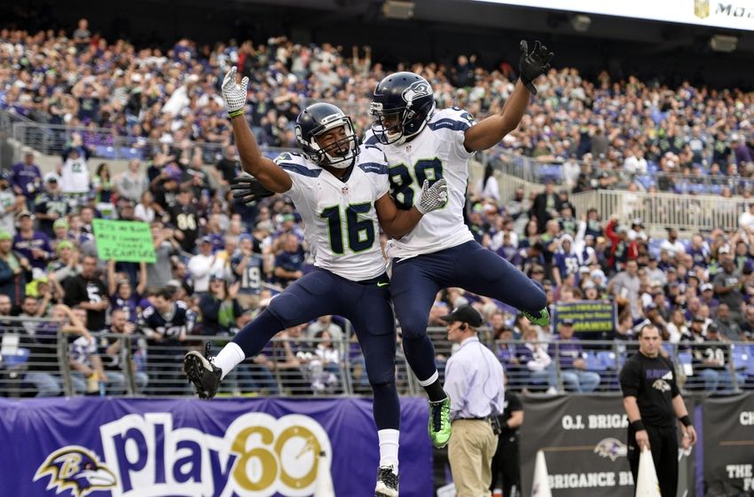 Seattle Seahawks wide receiver Tyler Lockett celebrates with wide receiver Doug Baldwin