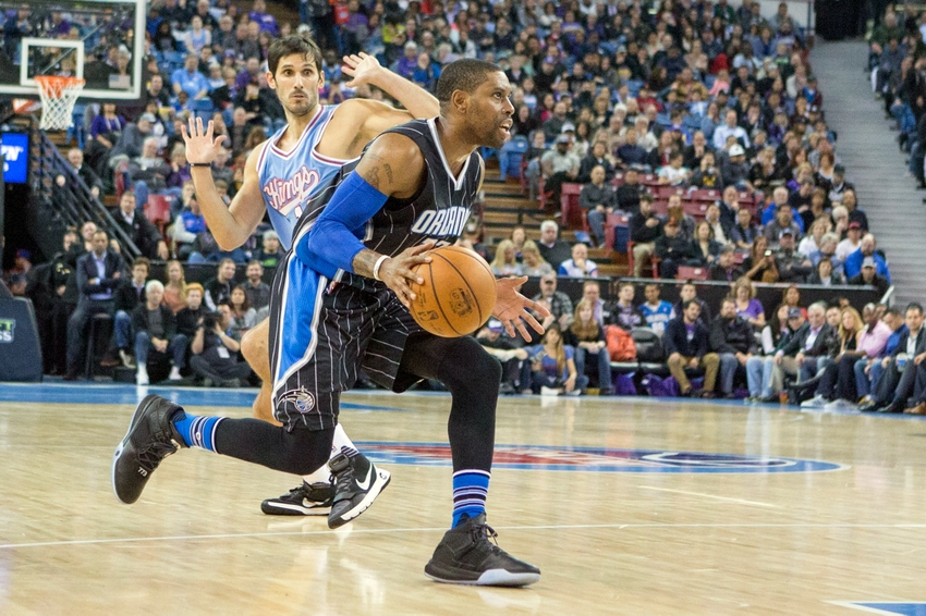 Mar 11, 2016; Sacramento, CA, USA; Orlando Magic guard C.J. Watson (32) dribbles the basketball against Sacramento Kings forward Omri Casspi (18) in the second quarter at Sleep Train Arena. Mandatory Credit: Neville E. Guard-USA TODAY Sports