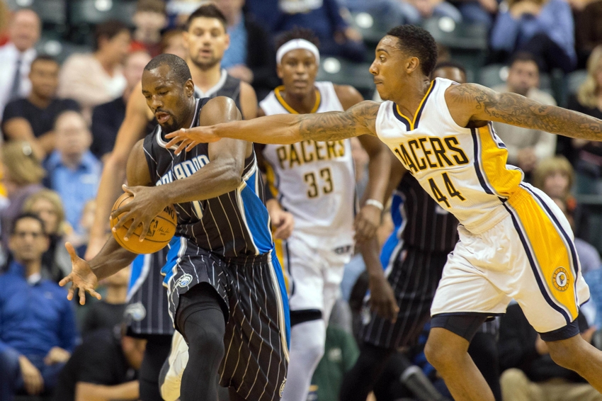 Nov 14, 2016; Indianapolis, IN, USA; Orlando Magic forward Serge Ibaka (7) pulls down a rebound while Indiana Pacers guard Jeff Teague (44) defends in the first quarter of the game at Bankers Life Fieldhouse. Mandatory Credit: Trevor Ruszkowski-USA TODAY Sports