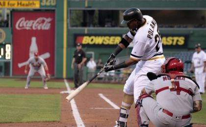 Sep 7, 2016; Pittsburgh, PA, USA; Pittsburgh Pirates right fielder Gregory Polanco (25) hits an RBI single against the St. Louis Cardinals during the first inning at PNC Park. Mandatory Credit: Charles LeClaire-USA TODAY Sports