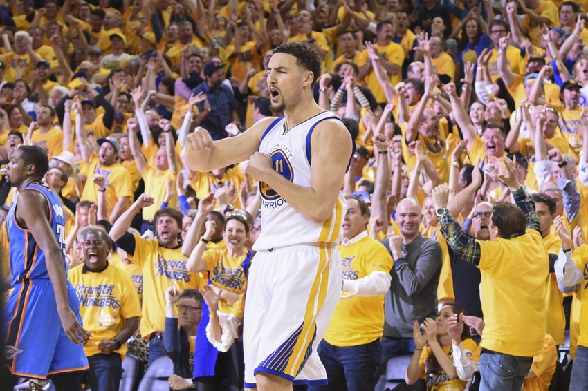 May 30, 2016; Oakland, CA, USA; Golden State Warriors guard Klay Thompson (11) celebrates after making a basket during the second quarter in game seven of the Western conference finals of the NBA Playoffs against the Oklahoma City Thunder at Oracle Arena. Mandatory Credit: Kyle Terada-USA TODAY Sports