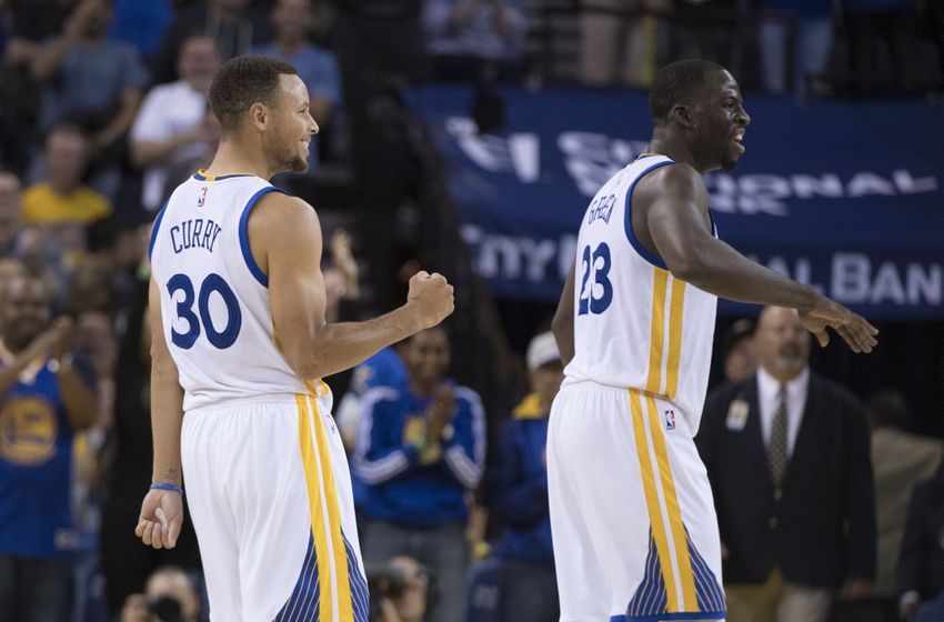 November 7, 2016; Oakland, CA, USA; Golden State Warriors guard Stephen Curry (30) celebrates with forward Draymond Green (23) after Curry made his 13th three-point basket during the fourth quarter against the New Orleans Pelicans at Oracle Arena. Curry made 13-three point baskets for the NBA record of most three-pointers in a single game. The Warriors defeated the Pelicans 116-106. Mandatory Credit: Kyle Terada-USA TODAY Sports