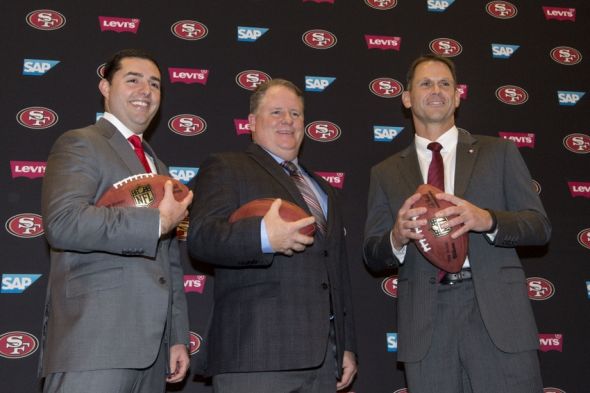 January 20, 2016; Santa Clara, CA, USA; San Francisco 49ers chief executive officer Jed York (left), Chip Kelly (center), and San Francisco 49ers general manager Trent Baalke (right) pose for a photo in a press conference after naming Kelly as the new head coach for the San Francisco 49ers at Levi's Stadium Auditorium. Mandatory Credit: Kyle Terada-USA TODAY Sports