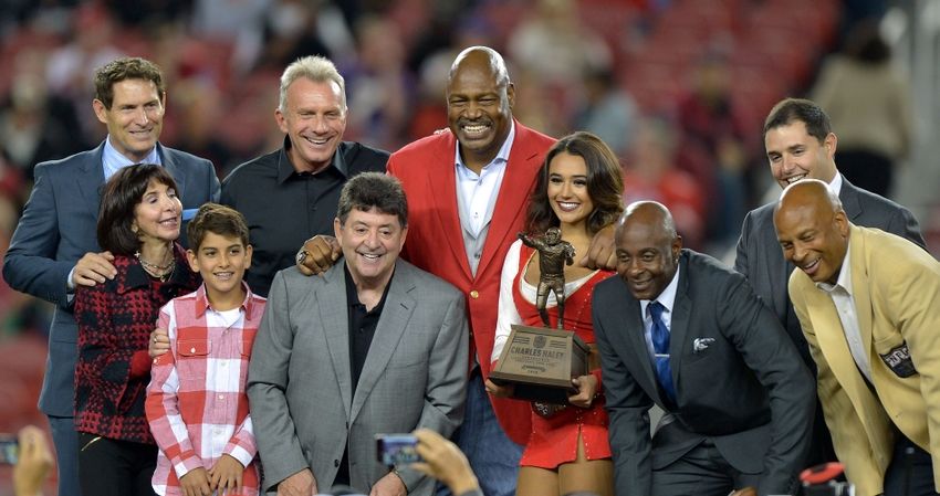 Sep 14, 2015; Santa Clara, CA, USA; San Francisco 49ers former defensive end Charles Haley (center) poses with Steve Young, Denise DeBartolo York, Eddie DeBartolo Jr., Joe Montana, Jerry Rice, Jed York and Ronnie Lott during halftime ceremony at Levi's Stadium. Mandatory Credit: Kirby Lee-USA TODAY Sports