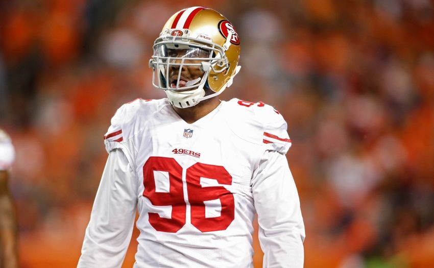Oct 19, 2014; Denver, CO, USA; San Francisco 49ers outside linebacker Corey Lemonier (96) during the game against the Denver Broncos at Sports Authority Field at Mile High. Mandatory Credit: Chris Humphreys-USA TODAY Sports