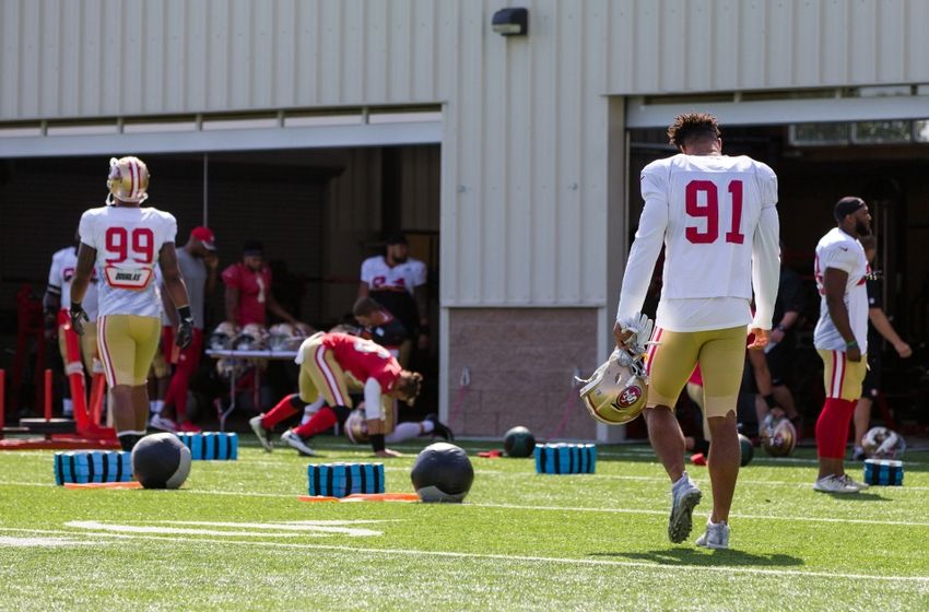Aug 4, 2016; Santa Clara, CA, USA; San Francisco 49ers defensive end Arik Armstead (91) and defensive end DeForest Buckner (99) walk out for training at SAP Performance Facility. Mandatory Credit: John Hefti-USA TODAY Sports