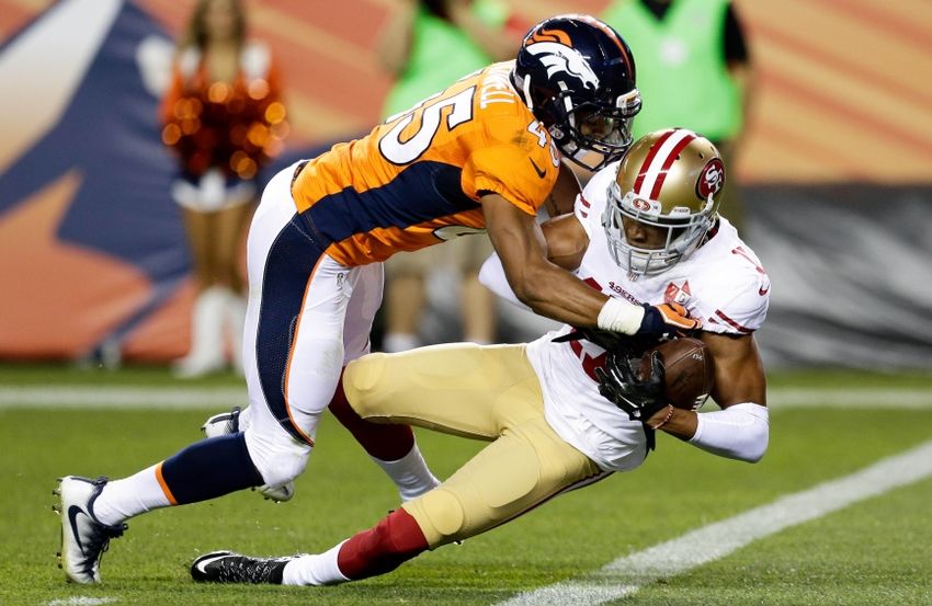 Aug 20, 2016; Denver, CO, USA; San Francisco 49ers wide receiver Dres Anderson (17) scores a touch down against Denver Broncos defensive back John Tidwell (45) in the fourth quarter at Sports Authority Field at Mile High. The 49ers defeated the Broncos 31-24. Mandatory Credit: Isaiah J. Downing-USA TODAY Sports