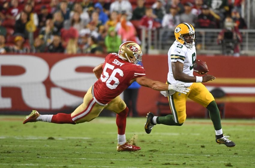 August 26, 2016; Santa Clara, CA, USA; Green Bay Packers quarterback Marquise Williams (9) runs with the football past San Francisco 49ers linebacker Shayne Skov (56) during the fourth quarter at Levi's Stadium. Mandatory Credit: Kyle Terada-USA TODAY Sports