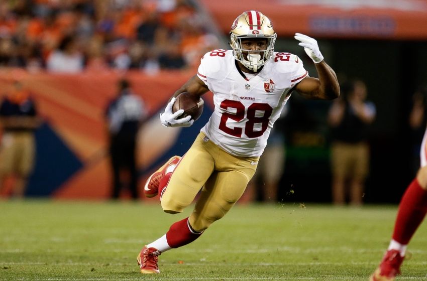 Aug 20, 2016; Denver, CO, USA; San Francisco 49ers running back Carlos Hyde (28) runs the ball for a first down in the second quarter against the Denver Broncos at Sports Authority Field at Mile High. Mandatory Credit: Isaiah J. Downing-USA TODAY Sports