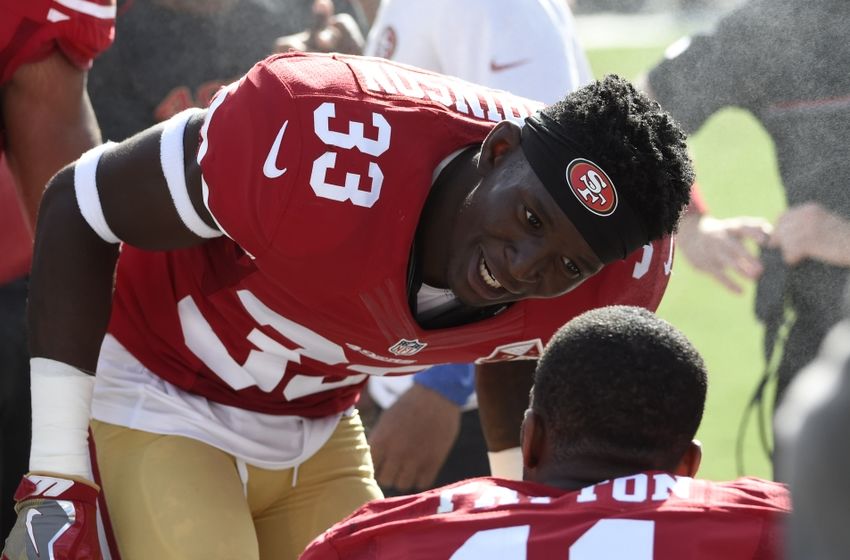 Sep 18, 2016; Charlotte, NC, USA; San Francisco 49ers cornerback Rashard Robinson (33) talks with wide receiver Quinton Patton (11) on the sidelines in the fourth quarter. The Panthers defeated the 49ers 46-27 at Bank of America Stadium. Mandatory Credit: Bob Donnan-USA TODAY Sports