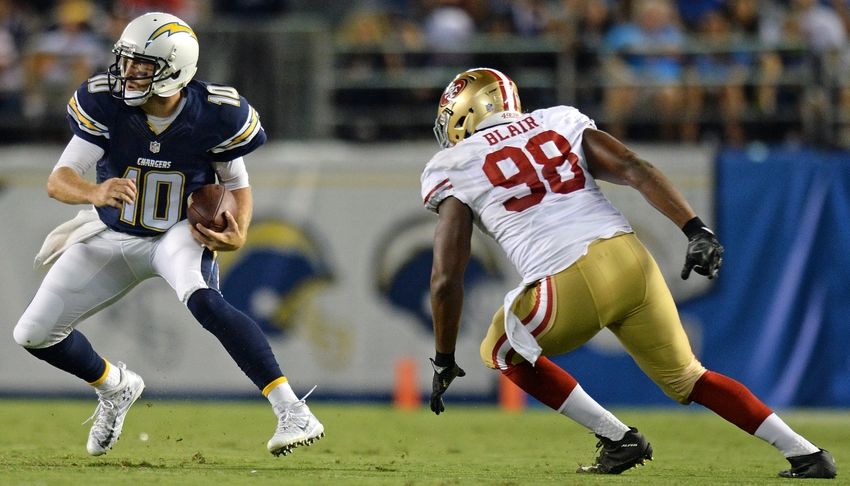 Sep 1, 2016; San Diego, CA, USA; Chargers quarterback Kellen Clemens (10) is defended by San Francisco 49ers defensive end Ronald Blair (98) on a second quarter run at Qualcomm Stadium. Mandatory Credit: Jake Roth-USA TODAY Sports