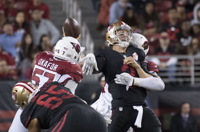October 6, 2016; Santa Clara, CA, USA; San Francisco 49ers quarterback Blaine Gabbert (2) is tackled by Arizona Cardinals outside linebacker Alex Okafor (57) and outside linebacker Chandler Jones (55) during the fourth quarter at Levi's Stadium. The Cardinals defeated the 49ers 33-21. Mandatory Credit: Kyle Terada-USA TODAY Sports