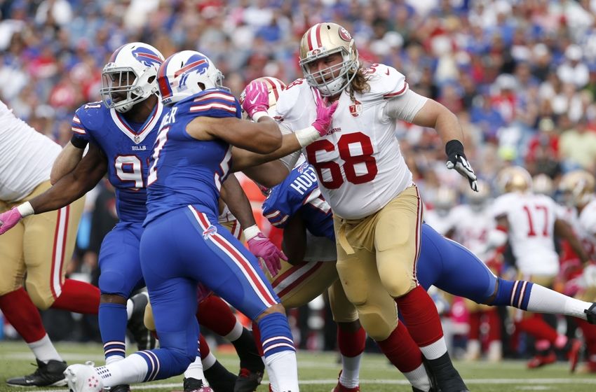 Oct 16, 2016; Orchard Park, NY, USA; San Francisco 49ers guard Zane Beadles (68) blocks Buffalo Bills linebacker Lorenzo Alexander (57) during the first half at New Era Field. Mandatory Credit: Timothy T. Ludwig-USA TODAY Sports