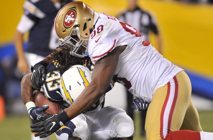 Sep 1, 2016; San Diego, CA, USA; San Diego Chargersrunning back Gus Johnson (33) is tackled by San Francisco 49ers defensive end Ronald Blair (98) during the second half of the game at Qualcomm Stadium. San Francisco won 31-21. Mandatory Credit: Orlando Ramirez-USA TODAY Sports