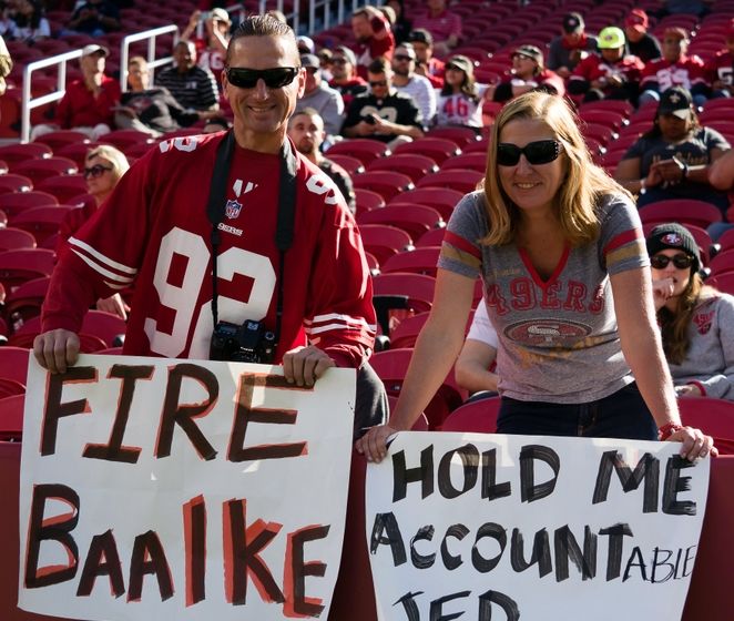 Nov 6, 2016; Santa Clara, CA, USA; San Francisco 49ers fans hold signs referencing general manager Trent Baalke and CEO Jed York before the game against the New Orleans Saints at Levi's Stadium. Mandatory Credit: Kelley L Cox-USA TODAY Sports