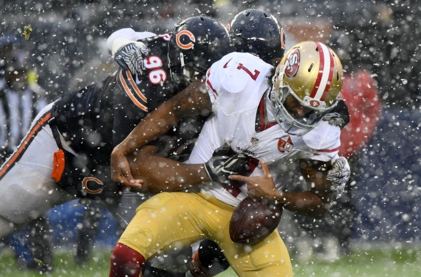 Dec 4, 2016; Chicago, IL, USA; Chicago Bears defensive end Akiem Hicks (96) knocks the ball away from San Francisco 49ers quarterback Colin Kaepernick (7) during the second half at Soldier Field. Mandatory Credit: Mike DiNovo-USA TODAY Sports