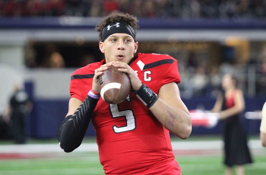 Nov 25, 2016; Arlington, TX, USA; Texas Tech Red Raiders quarterback Patrick Mahomes (5) warms up on the bench during the game against the Baylor Bears at AT&T Stadium. Texas Tech defeated Baylor 54-35. Mandatory Credit: Michael C. Johnson-USA TODAY Sports