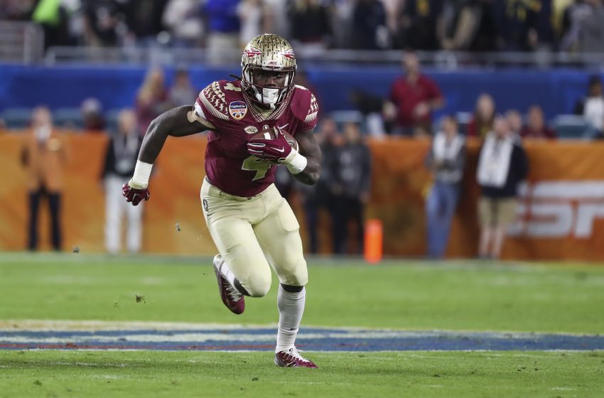 Dec 30, 2016; Miami Gardens, FL, USA; Florida State Seminoles running back Dalvin Cook (4) runs the ball in the first quarter against the Michigan Wolverines at Hard Rock Stadium. Mandatory Credit: Logan Bowles-USA TODAY Sports