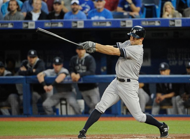 Sep 22, 2015; Toronto, Ontario, CAN; New York Yankees left fielder Brett Gardner (11) batting against Toronto Blue Jays in the first inning at Rogers Centre. Mandatory Credit: Peter Llewellyn-USA TODAY Sports