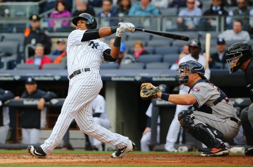 Apr 7, 2016; Bronx, NY, USA; New York Yankees shortstop Starlin Castro (14) singles to deep left during the second inning against the Houston Astros at Yankee Stadium. Mandatory Credit: Anthony Gruppuso-USA TODAY Sports 