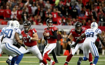 Nov 22, 2015; Atlanta, GA, USA; Atlanta Falcons quarterback Matt Ryan (2) drops back to pass as guard Andy Levitre (67) and offensive tackle Jake Matthews (70) block in the first quarter of their game against the Indianapolis Colts at the Georgia Dome. The Colts won 24-21. Mandatory Credit: Jason Getz-USA TODAY Sports