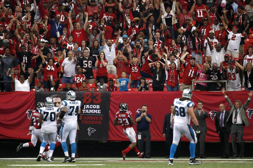 Oct 2, 2016; Atlanta, GA, USA; The crowd reacts after Atlanta Falcons cornerback Robert Alford (23) returns an interception for a touchdown in the fourth quarter of their game against the Carolina Panthers at the Georgia Dome. The Falcons won 48-33. Mandatory Credit: Jason Getz-USA TODAY Sports