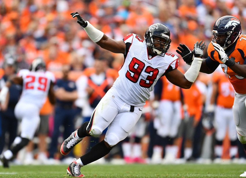Oct 9, 2016; Denver, CO, USA; Atlanta Falcons defensive end Dwight Freeney (93) pass rushes on Denver Broncos offensive tackle Russell Okung (73) in the second half at Sports Authority Field at Mile High. The Falcons defeated the Broncos 23-16. Mandatory Credit: Ron Chenoy-USA TODAY Sports