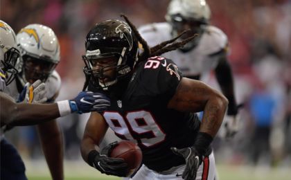 Oct 23, 2016; Atlanta, GA, USA; Atlanta Falcons defensive end Adrian Clayborn (99) returns a fumble for a touchdown against the San Diego Chargers during the second quarter at the Georgia Dome. Mandatory Credit: Dale Zanine-USA TODAY Sports