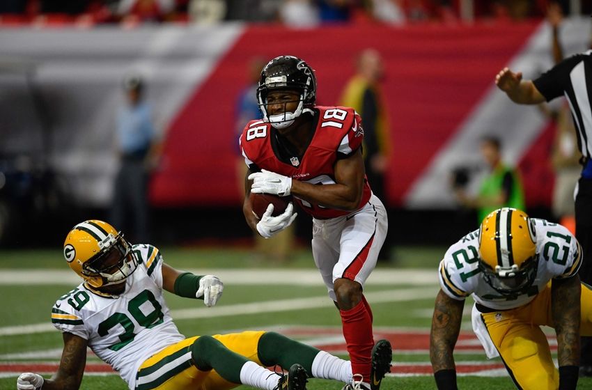Oct 30, 2016; Atlanta, GA, USA; Atlanta Falcons wide receiver Taylor Gabriel (18) reacts after catching a touchdown pass against Green Bay Packers cornerback Demetri Goodson (39) during the first quarter at the Georgia Dome. Mandatory Credit: Dale Zanine-USA TODAY Sports