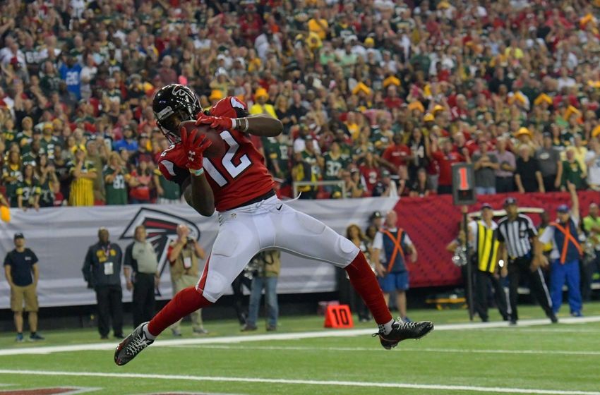 Oct 30, 2016; Atlanta, GA, USA; Atlanta Falcons wide receiver Mohamed Sanu (12) catches the winning touchdown pass against the Green Bay Packers with 34 seconds left in the fourth quarter at the Georgia Dome. The Falcons defeated the Packers 33-32. Mandatory Credit: Dale Zanine-USA TODAY Sports