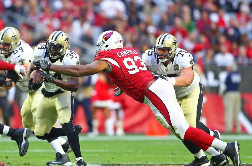 Dec 18, 2016; Glendale, AZ, USA; New Orleans Saints offensive tackle Andrus Peat (75) blocks for running back Tim Hightower (34) against Arizona Cardinals defensive tackle Calais Campbell (93) at University of Phoenix Stadium. The Saints defeated the Cardinals 48-41. Mandatory Credit: Mark J. Rebilas-USA TODAY Sports