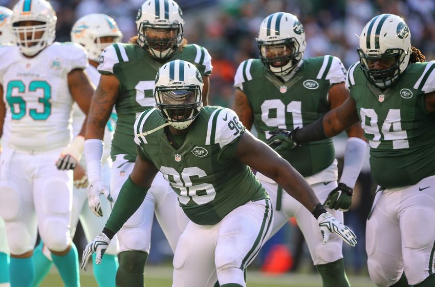 ryan-tannehill-muhammad-wilkerson-nfl-mi