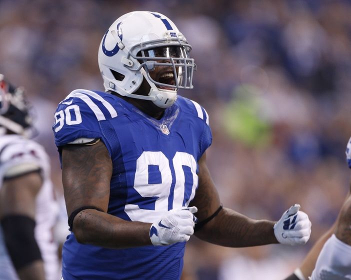Dec 20, 2015; Indianapolis, IN, USA; Indianapolis Colts defensive end Kendall Langford (90) reacts after a sack against the Houston Texans at Lucas Oil Stadium. Mandatory Credit: Brian Spurlock-USA TODAY Sports