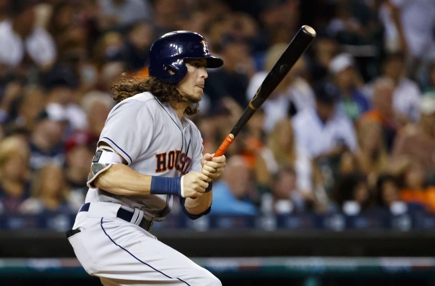 Jul 29, 2016; Detroit, MI, USA; Houston Astros left fielder Colby Rasmus (28) hits a two RBI single in the eighth inning against the Detroit Tigers at Comerica Park. Mandatory Credit: Rick Osentoski-USA TODAY Sports