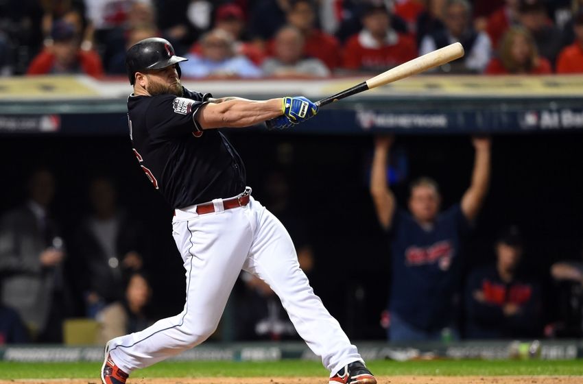 Nov 1, 2016; Cleveland, OH, USA; Cleveland Indians first baseman Mike Napoli hits a single against the Chicago Cubs in the fourth inning in game six of the 2016 World Series at Progressive Field. Mandatory Credit: Tommy Gilligan-USA TODAY Sports