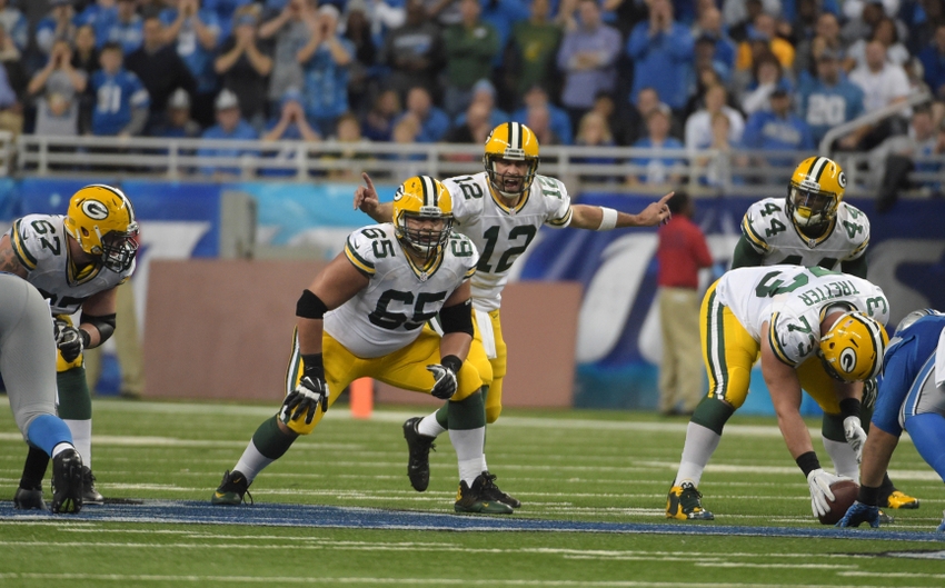 Green Bay Packers quarterback Aaron Rodgers (12) prepares to the snap as tackle Don Barclay (67), outside linebacker Andy Mulumba (55), tackle J.C. Tretter (73) and running back James Starks (44) line up at the line of scrimmage during an NFL football game against the Detroit Lions at Ford Field. The Packers defeated the Lions 27-23. Kirby Lee-USA TODAY Sports