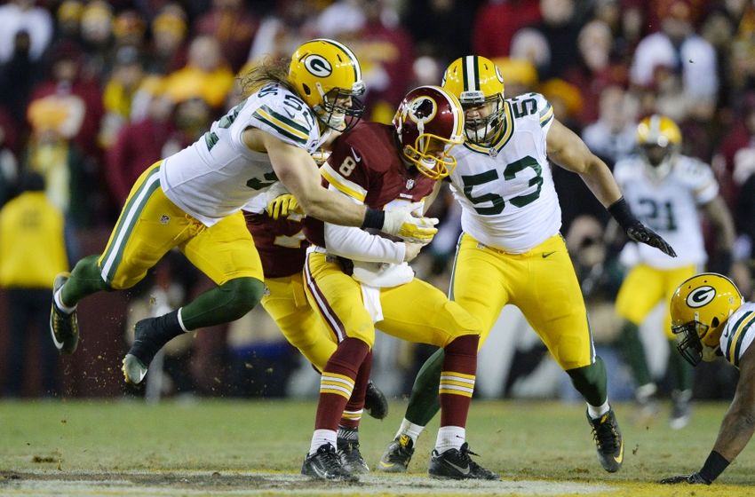 Jan 10, 2016; Landover, MD, USA; Green Bay Packers inside linebacker Clay Matthews (52) and Green Bay Packers outside linebacker Nick Perry (53) sack Washington Redskins quarterback Kirk Cousins (8) during the second half in a NFC Wild Card playoff football game at FedEx Field. Mandatory Credit: Brad Mills-USA TODAY Sports