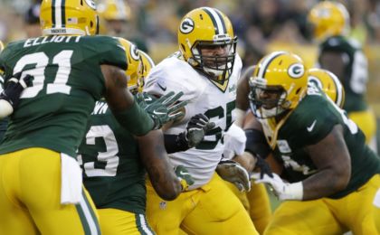 Jul 31, 2016; Green Bay,WI, USA; Green Bay Packers guard Lane Taylor (65) looks for someone to block during the team