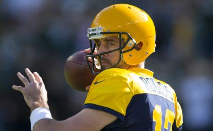 Oct 16, 2016; Green Bay, WI, USA; Green Bay Packers quarterback Aaron Rodgers (12) throws a pass during warmups prior to the game against the Dallas Cowboys at Lambeau Field. Mandatory Credit: Jeff Hanisch-USA TODAY Sports