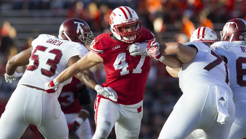 Wisconsin Badgers linebacker Vince Biegel (47) rushes the quarterback during the fourth quarter against the Troy Trojans at Camp Randall Stadium. Wisconsin won 28-3. Mandatory Credit: Jeff Hanisch-USA TODAY Sports