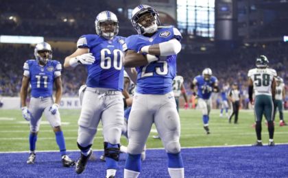 Oct 9, 2016; Detroit, MI, USA; Detroit Lions running back Theo Riddick (25) celebrates with teammates center Graham Glasgow (60) and wide receiver Marvin Jones (11) after a touchdown run during the first quarter against the Philadelphia Eagles at Ford Field. Mandatory Credit: Raj Mehta-USA TODAY Sports