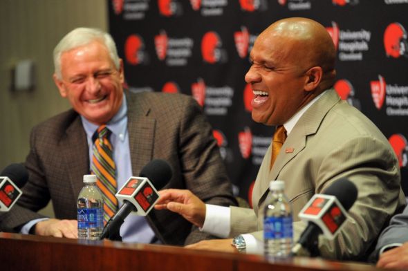 Jan 13, 2016; Berea, OH, USA; Cleveland Browns owner Jimmy Haslam (left) and new head coach Hue Jackson talk during a press conference at the Cleveland Browns training facility. Mandatory Credit: Ken Blaze-USA TODAY Sports