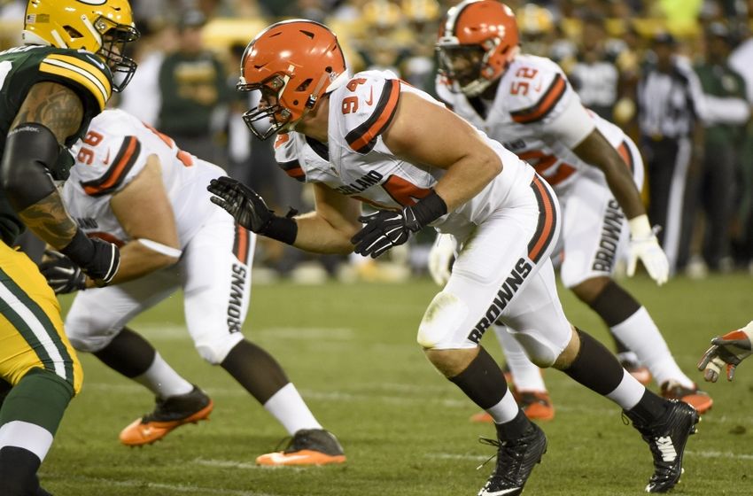 Aug 12, 2016; Green Bay, WI, USA; Cleveland Browns defensive lineman Carl Nassib, right, applies pressure against the Green Bay Packers in the second quarter at Lambeau Field. Mandatory Credit: Benny Sieu-USA TODAY Sports